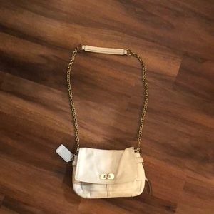 Ivory coach purse